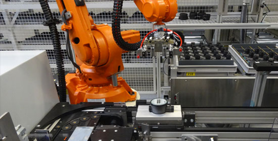 Robotic assembly line for electronics